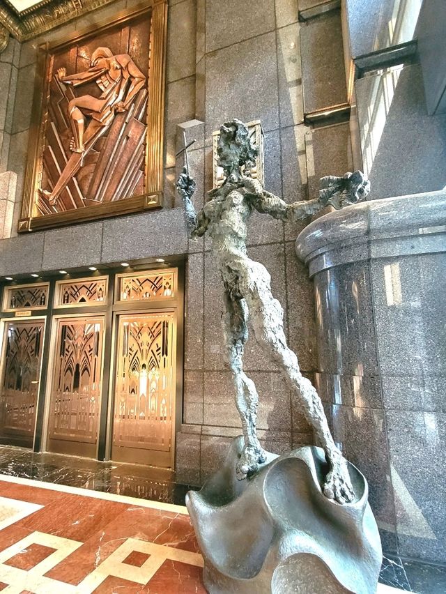 Heroic sculptures at ATLAS bar