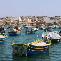 🚗🌊 Ride Sharing Travel in Marsaxlokk: Budget-Friendly Vibes in Malta’s Fishing Gem