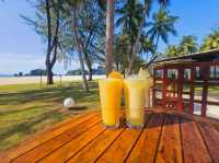 Relaxing and sipping a refreshing glass of juice at Tanjung Rhu Resort