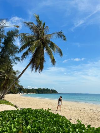 Wua Laen Beach is a quiet beach with white sand and palm trees.