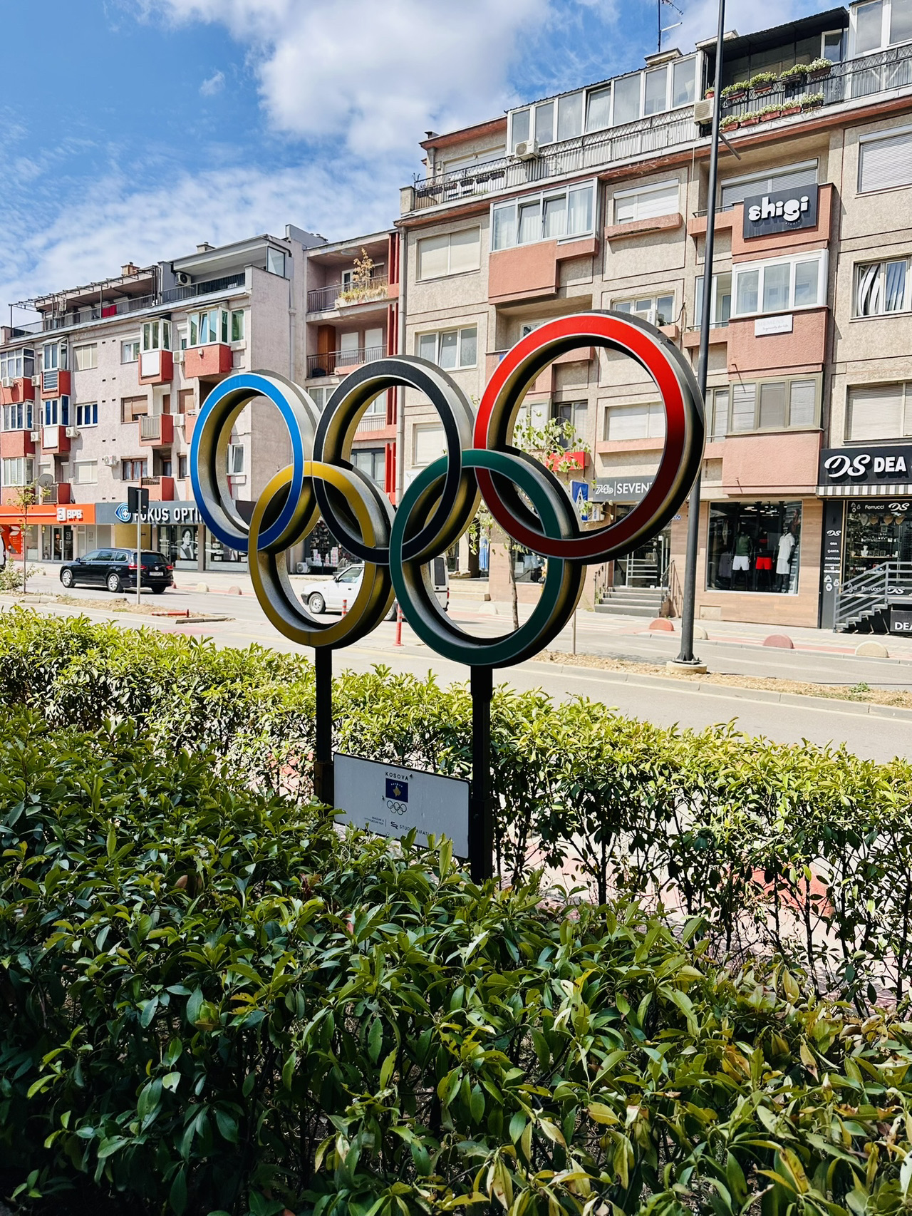 🇽🇰A full-day cultural walking and coffee-hopping itinerary in Pristina, the capital of newly independent Kosovo.🇽🇰
Starting from Skopje, the capital of North Macedonia, it's about a 2-hour drive one way. This perfectly caters to locals craving a taste of "modern Western vibes, café culture, leisurely shopping, and landmark photo-ops."
Needs.

🗺️ Pristina One-Day Tour Route Overview

🚌 Morning: Departure & The Start of Western Coffee Culture
08:00 - 10:00 Cross-border bus to Kosovo🇽🇰

Take the first cross-border bus of the morning from Skopje Central Bus Station to Pristina. Transit info: A one-way ticket costs around €10, and the ride takes roughly 1 hour and 55 minutes. Since you'll be crossing a border, make sure you have your passport handy!

10:30 - 12:00 Strolling the Boulevard & Coffee Time at Espressolab

First Stop: Mother Teresa Boulevard. After arriving at the Pristina bus station, take a short walk or a quick cab ride to Mother Teresa Boulevard right in the city center. This wide pedestrian street is bursting with a chic, modern European vibe. Lined with outdoor cafes, boutique clothing stores, and bookshops, it’s the ultimate starting point to experience the local love for "strolling culture (Xhiro)."

A Pilgrimage for Specialty Coffee: Espressolab Kosova. Originally from Turkey and now making waves across Europe, this boutique coffee chain’s Pristina branch perfectly blends a "laboratory" industrial aesthetic with modern Western coffee culture.

Cultural Experience: Order a precisely measured single-origin pour-over or their signature espresso, paired with a daily fresh-baked Western-style cinnamon roll or French croissant. Sit back in this sleek, glass-and-metal space, people-watch the stylish Kosovar youth, and just soak in the lazy morning vibes.

🍔 Noon: American Cultural Immersion & A Pepsi Lunch

12:30 - 14:00 Finding Western Modernity & Giant Cola Logos for Lunch: Kosovo is actually one of the most pro-American regions in all of Europe. You’ll find plenty of American-style burger joints and trendy Western restaurants around the boulevard. When the walking gets a bit too hot, step into a stylish local spot (like Soma Book Station or a burger joint on the main drag). Grab a classic American meal and crack open an ice-cold Pepsi. Here, enjoying a burger and a soda to a good playlist isn't just lunch—it’s a daily symbol of the younger generation’s love for modern Western pop culture.

📸 Afternoon: Olympic Memorial & Contemporary Western Landmark Hopping/Shopping

14. 30 - 15:30 Finding the Olympic Rings Monument in Front of the Stadium: Take a stroll to the plaza in front of the House of Sports near the main stadium. Kosovo has been killing it in international sports lately (especially sweeping up gold medals in Olympic judo). This Olympic Rings Monument was erected specifically to celebrate and commemorate Kosovo's official integration into the global Western sports community. The colorful rings symbolize this emerging nation’s pride in connecting with the world—making it the perfect spot to snap a photo that screams modernity and honor.

15. 30 - 16:30 Nearby Landmark: NEWBORN Independence Monument. Just across from the Olympic rings and the Palace of Youth and Sports sits Kosovo’s most famous Western landmark: the NEWBORN monument. These massive English letters get a fresh coat of graffiti every year, broadcasting messages of peace, freedom, and alignment with European Western values to the world. It’s easily the most dynamic contemporary art installation in Kosovo.

16. 30 - 18:00 Final Shopping Spree on the Boulevard. Meandering through the pedestrian street and its surrounding shopping alleys, you can browse local clothing chains, European cosmetics shops, or pick up some quirky Western-style souvenirs featuring "NEWBORN" or the Kosovo map. Prices in Kosovo are incredibly cheap compared to the rest of Europe, so it's a fantastic place to shop 'til you drop.

🚌 Evening: A Fully Loaded Return Trip. 18:30 Arrive at the bus station to head back. Return Info: Hop in a taxi back to the Pristina bus station as evening approaches.
We recommend catching the cross-border bus back to Skopje, North Macedonia around 18:10 or 20:50 (double-check the exact times at the ticket window that day, or look them up in advance via the Gjirafa Travel platform). Head back to Macedonia as night falls, carrying the lingering aroma of coffee and a day full of contemporary Western cultural vibes.

Highly Important & 100% Accurate Geopolitical Travel Advice!
When traveling through the Balkans, the order of entry and exit between Kosovo and Serbia is an ironclad rule every independent traveler must follow. If you mess up the sequence, Serbian border control will flag you for "illegal entry." Best case scenario: you get denied entry and turned back. Worst case: you face a hefty fine or a permanent black mark on your travel record.

Here is a detailed breakdown of the historical context, the root of the conflict, and a completely legal border-crossing guide:
❌ Why is "Entering Kosovo, Exiting Serbia" considered illegal? The core issue boils down to sovereignty recognition:
Political Reality: Kosovo declared independence from Serbia in 2008 and is recognized by a majority of Western nations, including the US, UK, and France. However, Serbia staunchly refuses to recognize Kosovo's independence.

Legal Definition: According to Serbian law and its constitution, Kosovo remains an inalienable, sacred part of Serbian territory (officially termed the "Autonomous Province of Kosovo and Metohija").

The Verdict of Illegal Entry: When you cross directly into Kosovo from North Macedonia (or Albania/Montenegro), Kosovo stamps your passport (or logs your entry in their system).
To the Serbian government, that border checkpoint you just used is an "illegal crossing unauthorized by the central Serbian government." So, if you try to travel straight north from Kosovo into Serbia, Serbian border guards will flip through your passport and notice you don't have a valid Serbian entry stamp. In their eyes, you practically "materialized out of thin air onto Serbian soil," making you an illegal immigrant. You will absolutely be stopped and denied entry on the spot.

📋 Right vs. Wrong Route Examples. To keep your trip hassle-free, stick to these completely legal "Golden Routes" and steer clear of the "Minefield Routes":
🟢 1. Completely Legal Routes (Highly Recommended)
Route A (Kosovo-Only Day Trip): Macedonia (Skopje) ➡️ Kosovo (Pristina) ➡️ Macedonia (Skopje). (This is exactly the itinerary you’re doing today—100% legal and safe.)

Route B (Serbia First, Kosovo Second): Any country ➡️ Serbia ➡️ Kosovo ➡️ Third country (like Macedonia/Albania). Why it works: You entered Serbia through a legal port of entry and got a Serbian stamp. Then you drove south into Kosovo. As far as Serbia is concerned, you’re just on a "domestic road trip." Leaving from Kosovo to Macedonia afterward is completely outside Serbia's jurisdiction.

Route C (The Detour Back into Serbia): Macedonia ➡️ Kosovo ➡️ Back to Macedonia (or detour through Montenegro/Bulgaria) ➡️ Serbia. Why it works: As long as you enter Serbia via an international border they actually recognize (like the Macedonia-Serbia border), it counts as a legal entry.

🔴 2. The Wrong Route That Will Definitely Get You Intercepted (The Minefield) Minefield route: Macedonia/Albania ➡️ Kosovo ➡️ Straight north across the border ➡️ Serbia. (Guaranteed interception and deportation)

Deportation)⚠️ Other Details on Kosovo Passport Stamps. Will Serbia "cancel" my Kosovo stamp? In recent years, if you entered Serbia from Kosovo with your passport (using the legal Route C), Serbian border guards seeing a Kosovo entry stamp would whip out a "CANCELLED" stamp and smack it right over the Kosovo one, sometimes even scribbling it out with a black pen. This is merely a political flex by Serbia and does not invalidate your passport in any other country. Recent customs practices: To save foreign travelers the headache, Kosovo customs rarely issues physical stamps anymore, opting for electronic scans instead. But even without a physical stamp, Serbian border guards will still ask you point-blank, "Where did you come from?" If they realize your last stop was Kosovo and you have no entry record for Serbia, you will still be denied entry.

💡 Final Travel Advice for You. Since your game plan is "Start in Macedonia ➡️ Pristina Day Trip ➡️ Back to Macedonia in the evening," this route is 100% safe and legal from both a political and border-control standpoint! You are merely bouncing between Macedonia and Kosovo, completely avoiding Serbia's sensitive border zones.