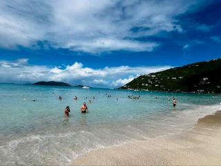 #winterescape 🏝️ Crystal Waters & Chill Vibes at Long Bay Beach, Beef Island  
Dive into paradise at Long Bay Beach, where powdery white sands meet turquoise waters and rolling hills frame the perfect backdrop for your beach adventure! This hidden gem on Beef Island is a dream spot for swimming, sunbathing, and unwinding in true BVI style.  

🗺️ Recommended Route:  
Start your day in Parham Town and head east over the bridge to Beef Island—it’s just a few minutes’ drive. Park nearby and stroll directly onto Long Bay Beach, where the scene is set for laid-back fun.  

🏊 Must-Do:  
Swim in the gentle, crystal-clear sea (perfect for groups!) and embrace the peaceful vibe. Bring snorkel gear to spot colorful marine life near the rocks at the ends of the bay.  

📸 Top Photo Spots:  
Snap your group swimming in sparkling shallows, with those distant green hills adding a natural “nature-vision” touch to your photos. The sunny shoreline makes every shot pop, especially midday when the water’s at its brightest.  

💡 Practical Tips:  
Arrive early for emptier sands and prime swimming conditions. There’s little shade, so pack a hat and sunscreen. Bring water and snacks—facilities are limited on-site.  

⚠️ Key Precautions:  
Check the tide and currents before heading into deeper water. Watch for sea urchins near rocky spots. Respect any marked conservation areas (no souvenirs from the beach!).  

#BritishVirginIslands #Tortola #BeachDay #NatureVision #TravelNotes