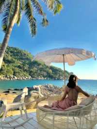 Phuket's backyard has a swing on the giant rock beach.