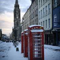 Best place to walk and see Edinburgh. All the historical buildings, cafes, and tourists.