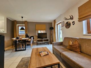 🌄 Obertraun shines with lakeside magic, and Dormio Resort Obertraun was both tranquil and scenic—two birds glided over the glassy waters as mountain rocks formed the perfect backdrop for a sunrise photo. This resort sits right by Hallstätter See, just a short drive to Hallstatt (plus bus and train links for easy exploration). Spacious cabin-style rooms are perfect for families; ask for a lake-facing unit for those insta-worthy bird-in-flight shots you’re dreaming of.

🍳 Breakfast delivers a good spread—fresh eggs, fruit, and breads—but you’ll have a handy kitchenette and a store on-site if you want to cook. Daytime means exploring lakeside cultural landscapes, hiking trails, or catching close-ups of rivers and nature (indoor and outdoor spaces both inspire). After sunset, unwind on your cabin terrace or explore Hallstatt’s fairy-tale alleys. Staff here are friendly and helpful, making local tips or arranging tours a breeze.

💡 Tip: Bring some quick snacks and essentials—remote Obertraun means stores close early. For problem-free comfort, check your cabin’s amenities on arrival and flag any issues with maintenance (like bathroom doors or worn buttons) right away. Book directly on trip.com for best value and flexible cancellation.

#Obertraun #LakesideHotel #NatureTravel #AustriaGetaway #tripdotcom