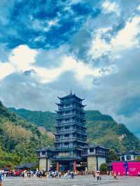 Rising like silent sentinels from the mist, the stone pillars of Zhangjiajie stand timeless and sere