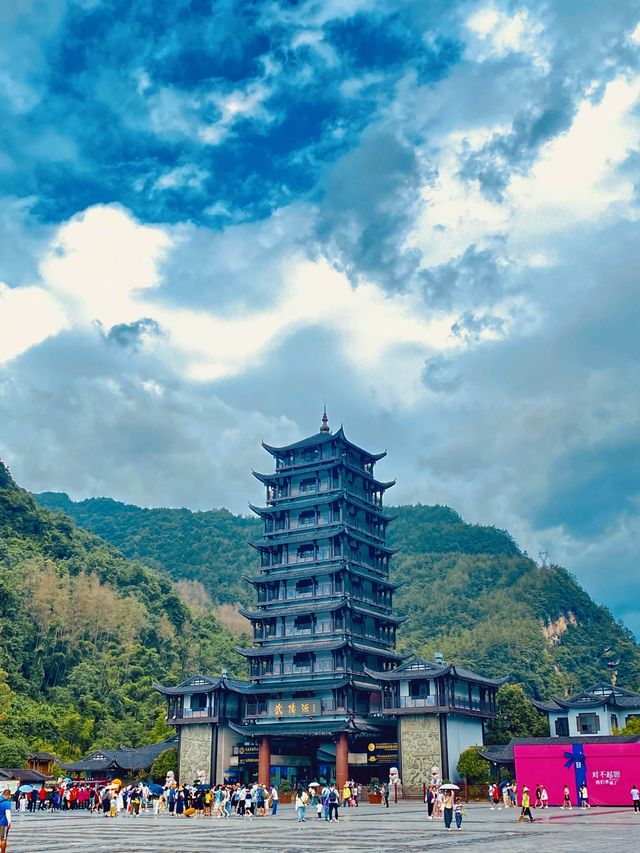 Rising like silent sentinels from the mist, the stone pillars of Zhangjiajie stand timeless and sere