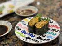 🍣 Fresh & Fun Conveyor‐Belt Dining at Dolphin Port