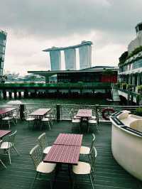 Calm Before the Rain: A Waterfront Stroll Near The Fullerton Bay Hotel
