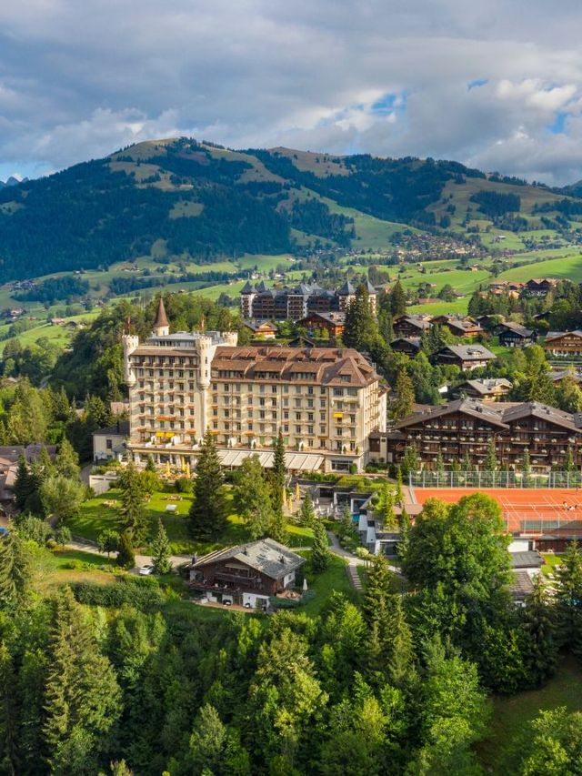 🏰✨ Gstaad's Grandeur: A Palace of Alpine Dreams 🌄