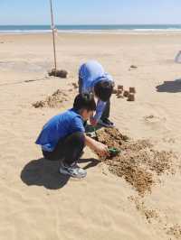 青島銀沙灘免費私藏攻略|沙灘野餐、趕海拾貝、日出日落