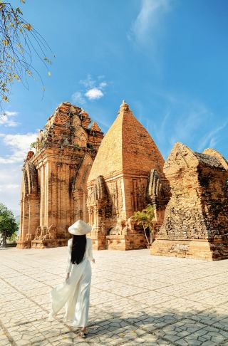 Champa Towers in Nha Trang: Unlocking the Divine South Seas Portrait in White Ao Dai