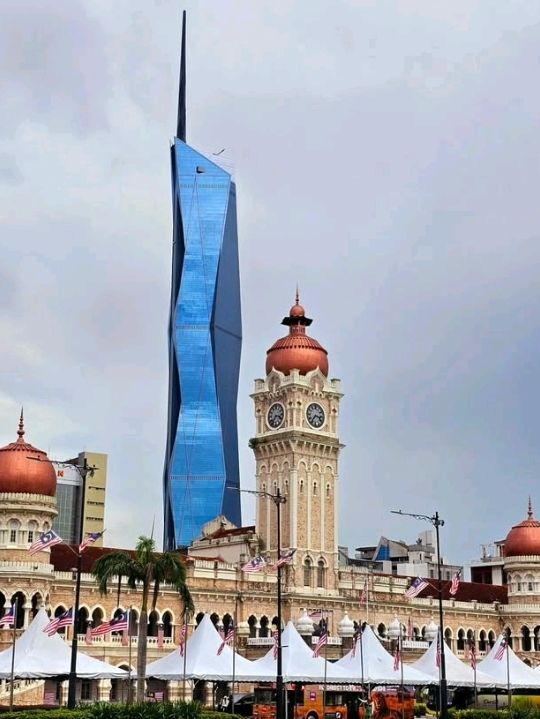 This historic iconic building looks magnificent and well-maintained, and is lit up with colorful lig