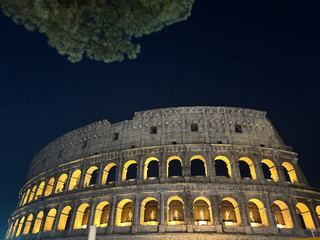 Take a stroll through the Colosseum at night.