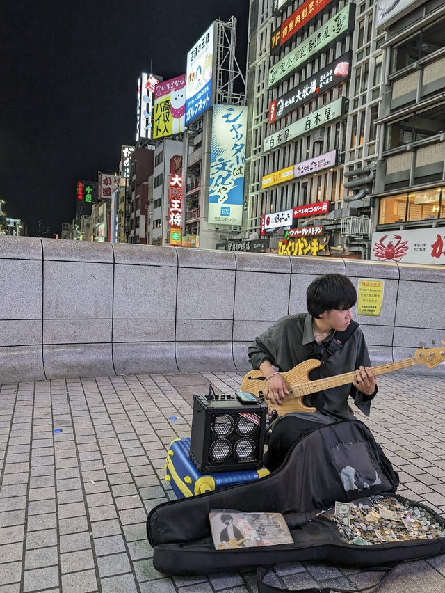Dotonbori Street with neon light and food 