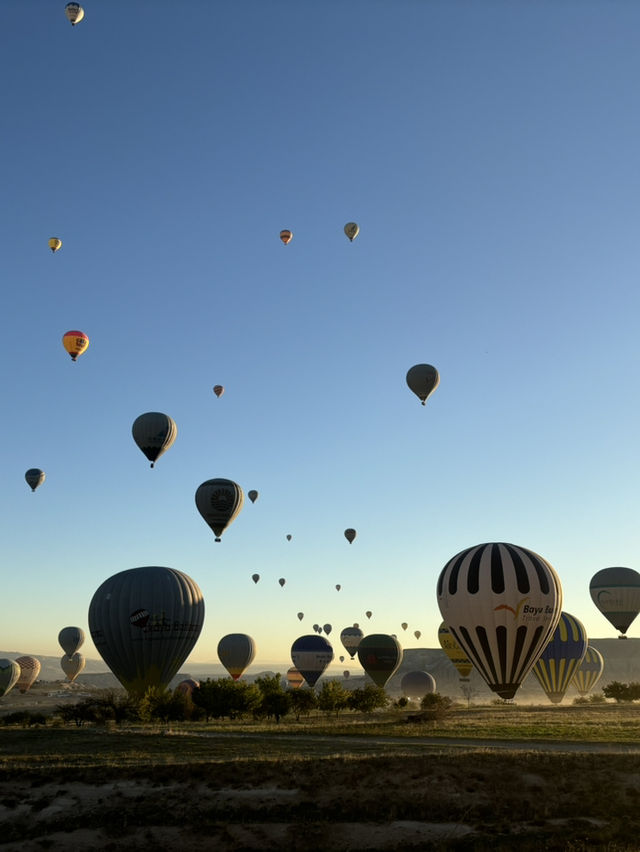 Sipping Sparkling Beneath Cappadocia’s Balloon-Filled Sky 🎈🥂