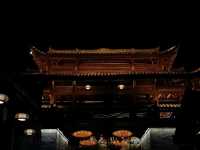Buyi Village by Night – Where Firelight Meets Folklore Under a Starry Sky