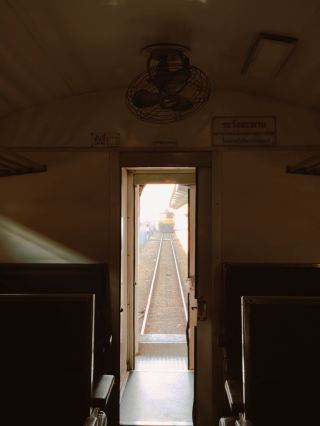 🚆 Review of Train No. 45

HAT YAI → PADANG BESAR 🇹🇭🇲🇾

If you want to start your Penang trip with a truly authentic train experience, Train No. 45 is one of the interesting routes. It's a special express train of the State Railway of Thailand that runs from Bangkok to Hat Yai, and then continues to Padang Besar, the Thai-Malaysian border, without changing trains at Hat Yai.

🚉 From Hat Yai to the Border

The journey from Hat Yai Junction to Padang Besar takes about 45 minutes. The distance isn't far, but the scenery changes steadily from Hat Yai station towards the border area.

The carriage I traveled in during this section felt very classic. The seats, the louvered windows, and the ceiling fans all contribute to a very classic Thai train experience.

🪑 What I liked about this train

What makes the journey interesting isn't the luxury, but the authentic atmosphere of traveling by train.

Along the way, you can enjoy the view through the louvered windows, the sunlight streaming into the carriage, and small details like the seat number signs, the fans, and the luggage racks. It feels like stepping back in time to ride an old-school Thai train.

For photography enthusiasts, this train offers numerous photo opportunities, from the train itself and the platforms to the details inside the carriages.

🇲🇾 What to do after arriving at Padang Besar?

Upon arrival at Padang Besar, prepare for Thai and Malaysian immigration procedures. Then, take the KTM Komuter train on the Malaysian side to Butterworth to continue your journey to Penang.

The train schedule for number 45 is important because it's an early morning train, allowing for onward travel into Malaysia on the same day. However, allow extra time for border procedures and check the latest KTM schedule before traveling.

📝 Summary from experience:

Train number 45 is suitable for those who are not in a hurry and want "travel" to be a part of their trip.

It doesn't offer the comfort of new or high-speed trains, but its charm lies in the train itself, the atmosphere, and the feeling of slowly making your journey from Hat Yai to the border. Before switching from Thai trains to the Malaysian railway system.

HAT YAI → PADANG BESAR → BUTTERWORTH → PENANG
From classic Thai trains to KTM trains and ending in Penang 🇹🇭🚆🇲🇾

📸 Original photos taken by myself.

#Hatyai #PadangBesar #Penang #TrainTravel #ThailandMalaysia