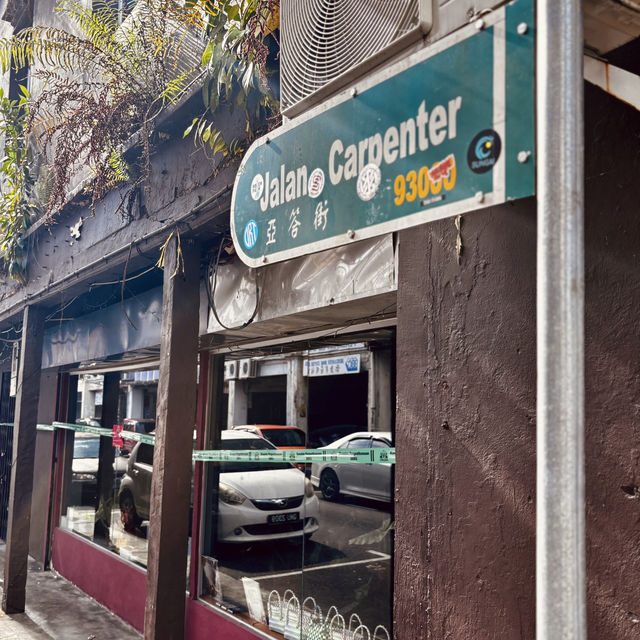 **"Wandering Through History: A Solo Adventure on Bishopgate and Carpenter Street in Kuching"**