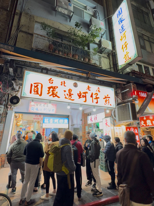 Oyster Egg Omelette on Conveyor Belt: Michelin Dish at Ningxia Night Market