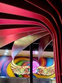 Enjoy colorful art, eclectic music and great hand tossed pizza at Mellow Mushroom