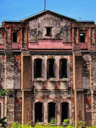 The weathered exterior tells a story of history, but the interior reveals vintage elegance.