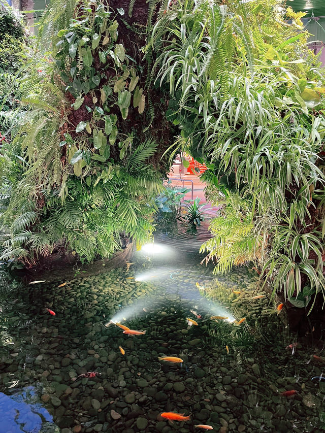 “The Enchanted Garden at Changi T2: A Serene Escape in the Sky”