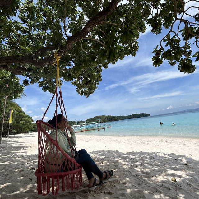 Pinkywhite Beach and Blue oceanicwater
