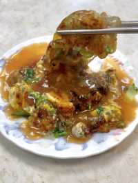 Oyster Egg Omelette on Conveyor Belt: Michelin Dish at Ningxia Night Market