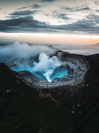 Blue fluorescent volcano nighttime hiking extreme experience 🌋