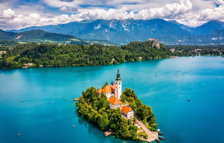 🇸🇮 Slovenia: Europe's Hidden Fairytale

Imagine emerald-green lakes, snow-capped mountains, medieval castles, charming old towns, and peaceful roads winding through the Alps. Welcome to Slovenia, one of Europe's most beautiful destinations for nature lovers and slow travelers! 🌿🏔️

📍 MUST-VISIT PLACES
· Lake Bled — a magical island church surrounded by mountains.
· Ljubljana — a charming capital filled with riverside cafés and colorful architecture.
· Lake Bohinj — a peaceful alpine lake perfect for hiking and relaxation.
· Vintgar Gorge — wooden walkways beside spectacular turquoise water.
· Piran — a beautiful coastal town on the Adriatic Sea.
· Triglav National Park — dramatic mountain scenery and outdoor adventures.

🗓️ SUGGESTED 5-DAY ITINERARY
Day 1: Explore Ljubljana's old town and riverside cafés.
Day 2: Visit Lake Bled, Bled Castle, and the island church.
Day 3: Discover Lake Bohinj and the Julian Alps.
Day 4: Walk through Vintgar Gorge and enjoy alpine scenery.
Day 5: Explore Piran's narrow streets and Adriatic coastline.

🍽️ WHAT TO TRY
Taste traditional potica cake, štruklji, jota stew, and the famous Bled cream cake.

📅 BEST TIME TO VISIT
May–June and September are excellent for pleasant weather, outdoor adventures, and scenic photography. July and August are popular for hiking and lake activities.

🎒 TRAVEL TIPS
· Use Ljubljana as a convenient starting point.
· Consider buses, trains, or a rental car to explore different regions.
· Bring comfortable walking shoes and layers for mountain weather.
· Book popular accommodation early during summer.
· Allow time to explore slowly instead of rushing between attractions.

Slovenia reminds us that the best journeys aren't always about how far we travel, but how deeply we experience each place. Would you choose the mountains, the lakes, or the seaside first? 💚✈️

#Slovenia  #LakeBled  #EuropeTravel  #HiddenGems  #SlowTravel  #TravelGuide  #NatureLovers  #Tripcom #naturalwonders #travel2026 #travel 