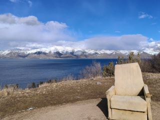 A pool of azure, an ancient monastery, a moment in the Caucasus