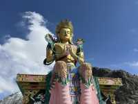 Buddha overlooking mountains 