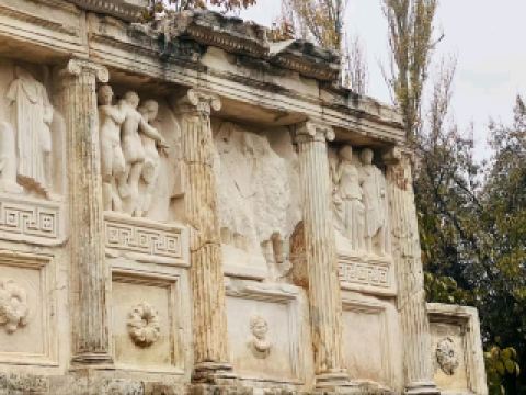 #winterescape Travel Back in Time at Afrodisias Müzesi 🏛️✨  
Step into the heart of ancient Anatolia at Afrodisias Müzesi, where sun-drenched marble pillars, evocative ruins, and striking sculptures bring history to life! This outdoorsy cultural landscape will thrill both art buffs and adventure seekers.  

Start your journey from Geyre Belediyesi—just a quick stroll brings you to the museum’s monumental entrance. Begin indoors, marveling at the awe-inspiring Aphrodite statues and intricate friezes, then wander outdoors to the sprawling ancient city. Don’t miss the stadium or the theater; both offer vivid glimpses into Greco-Roman city life.  

For photos: Snap the iconic row of Corinthian pillars at golden hour for an unbeatable “ruins rising from the landscape” shot. The grand Tetrapylon is another Instagram-magnet, especially with clouds building or under clear skies for dramatic effect—both sunny and rainy clouds add mood to your gallery! For up-close architectural details, focus on the temple carvings—morning light really brings out the textures.  

Tips:  
- Arrive early (by 9 AM) for cooler weather and quiet ruins—perfect for undisturbed exploration and photos.  
- Paths are mostly outdoors and can be uneven; comfortable walking shoes are a must!  
- Carry water, especially in summer, as shade is limited.  
- Quick showers do happen, so a lightweight rain jacket can be a lifesaver.  

Precaution: Don’t climb on the ruins to protect both yourself and these ancient treasures.  

#Afrodisias #HistoricalSites #TravelTürkiye #AncientRuins #CulturalAdventure
