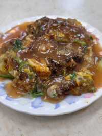 Oyster Egg Omelette on Conveyor Belt: Michelin Dish at Ningxia Night Market