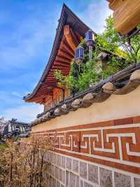 Bukchon Hanok Village: Time-Travel Through Seoul’s Most Photogenic Alleys"** 🏮🏡