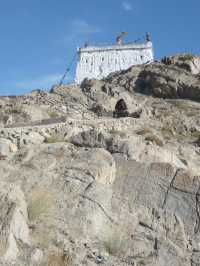 Stupa on Hilltop with Views of Leh Palace