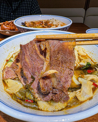 This Henan-style braised noodles in Beverly Hills is amazing! You can even finish the bone broth!