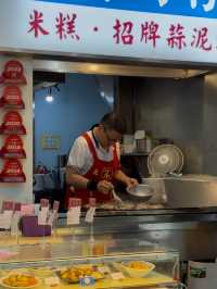 Oyster Egg Omelette on Conveyor Belt: Michelin Dish at Ningxia Night Market