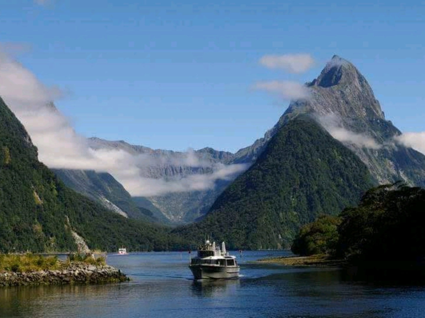Milford Sound, a World Heritage Site, is featured on a sightseeing cruise in Milford Sound, Southland, New Zealand.