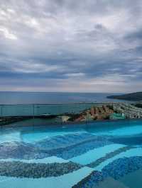 Hillside Sky in Sunset Town: rooftop pool, sea views, and fireworks