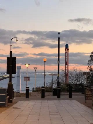 A small town near London with a pink misty sea today