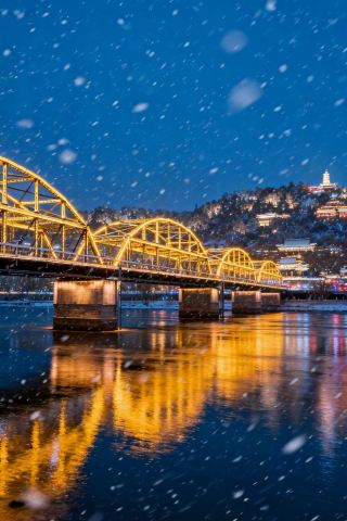 雪が金城に降り積もり、一目で千年を感じる：冬の蘭州中山橋絶景チェックインガイド