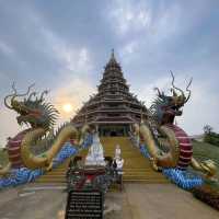 Amazing white Buddha statue with snake 