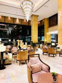 “Eco-Luxe Escape: Lobby Lounge at Shangri-La KL”