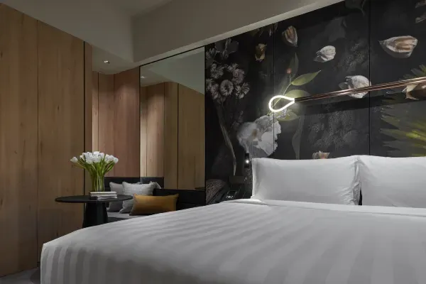 Luxurious bedding with plush pillows and quality linens.