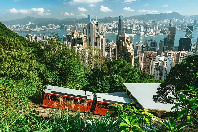 Hong Kong harbour view from Victoria peak with a tram going up