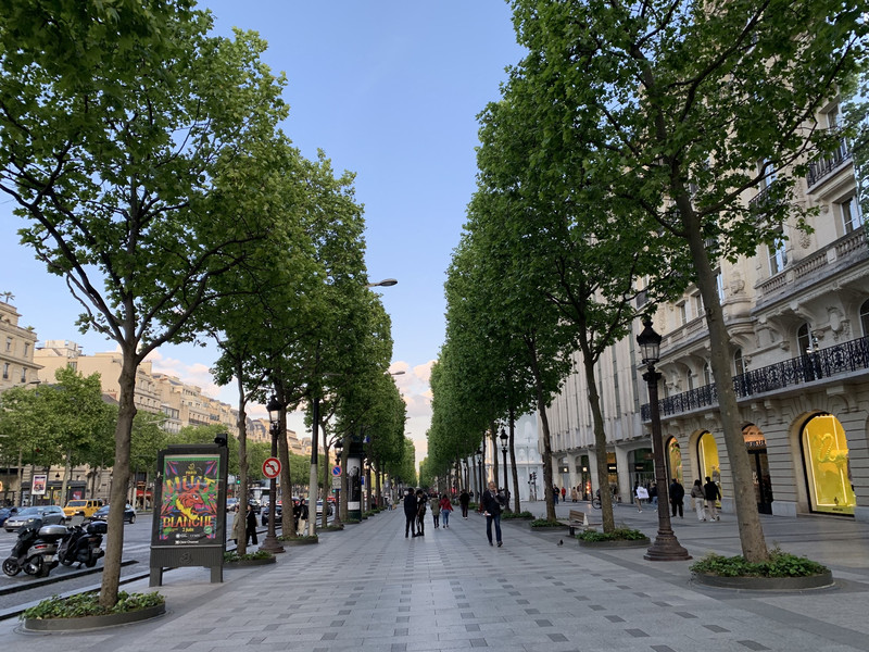 Street View Of Champselysees Avenue With Building Louis Vuitton In