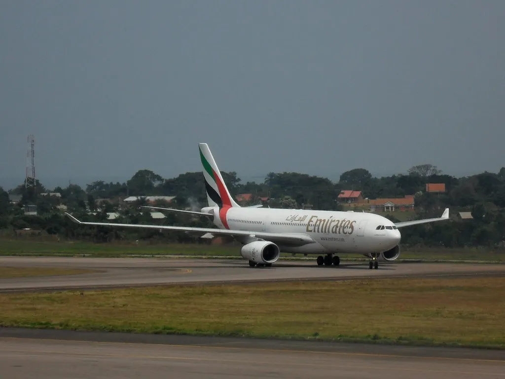 An airplane taxing on Entebbe International Airport's runway. Source: Photo by Timothy Kalyegira / Flickr