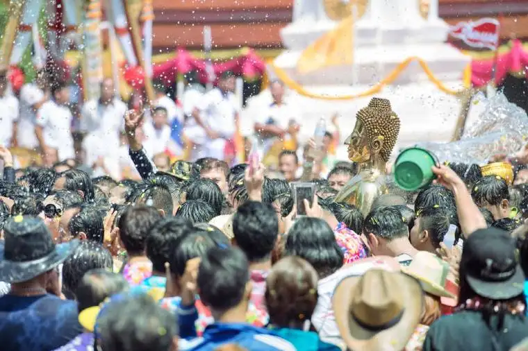 Locals celebrating a traditional Songkran in Chiang Mai